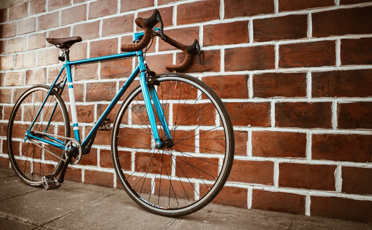 Cyclist commuting through a German city street