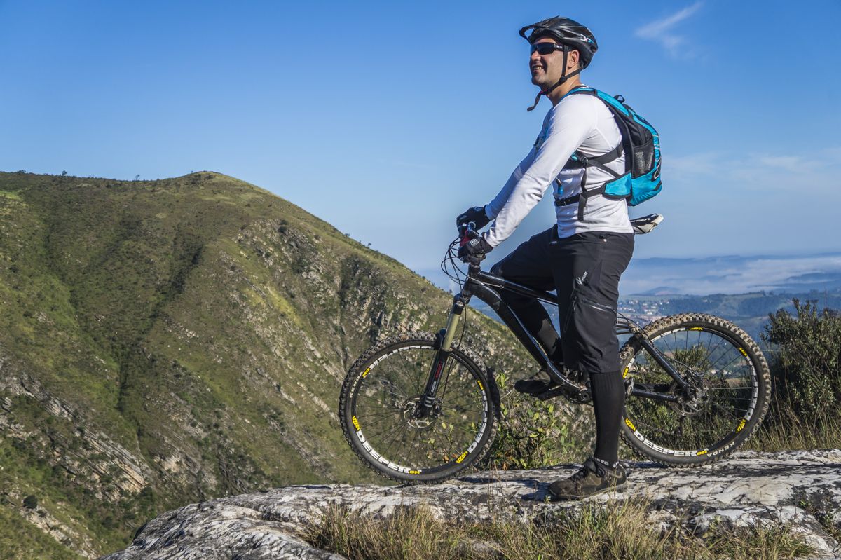 Mountain bicycle being ridden on a forest trail